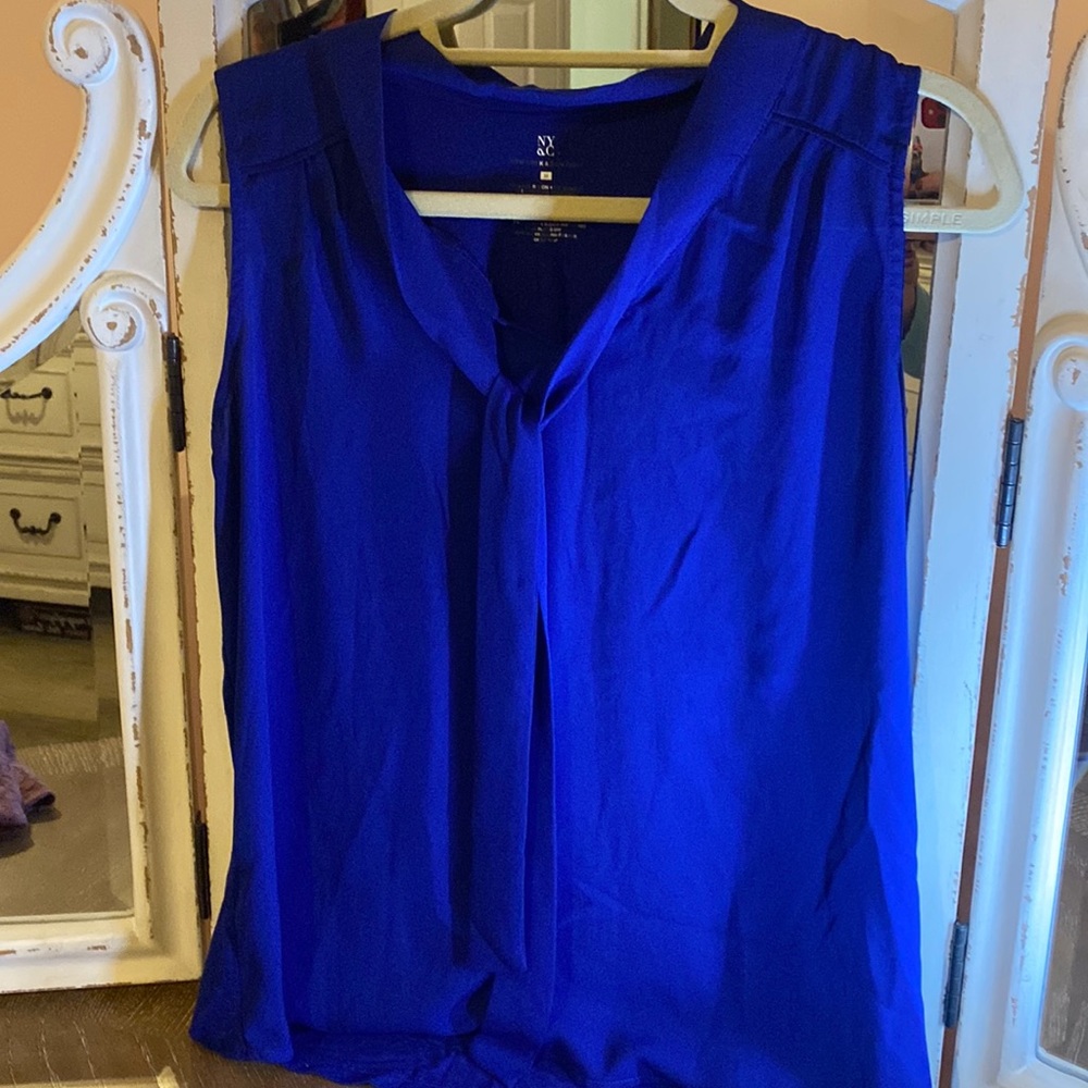 Cute NYC blouse . Size m bright purple /blue